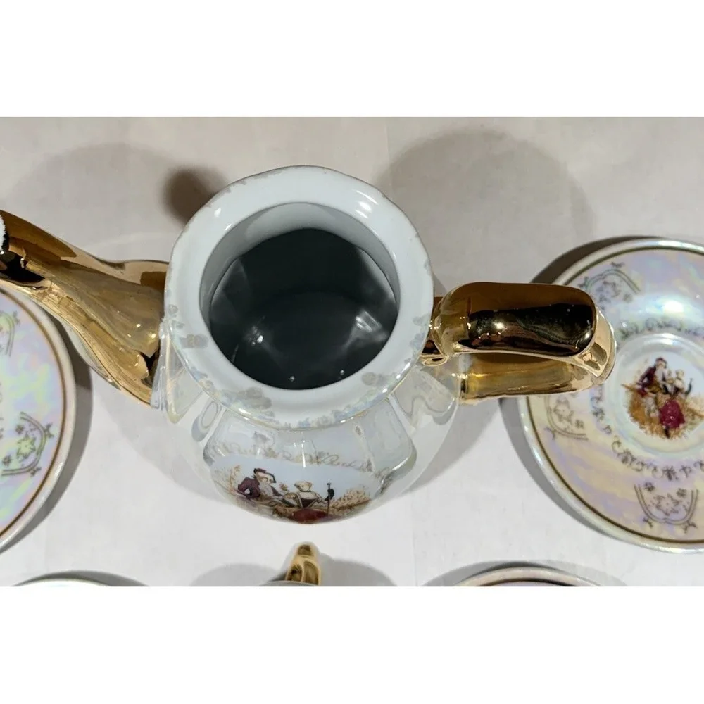 Romeo And Juliet Tea Pot 4 Tea Cups 4 Saucers Gold Trim Handles Iridescent White